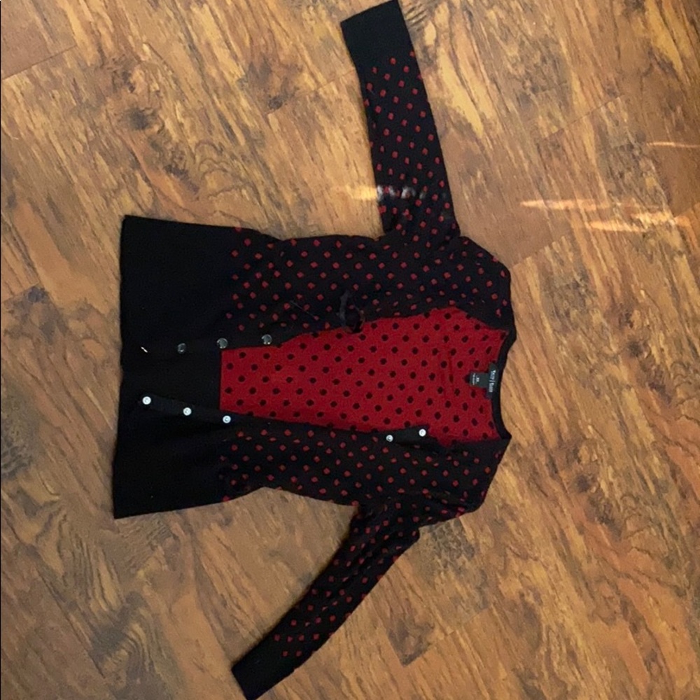 Black and red polka dot snap to close sweater
